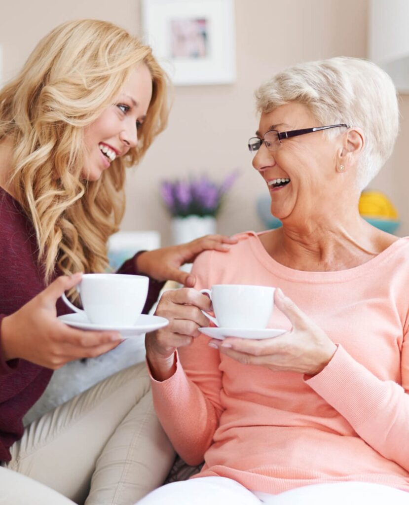 Adult Child with Senior Mother at Memory Care Facility
